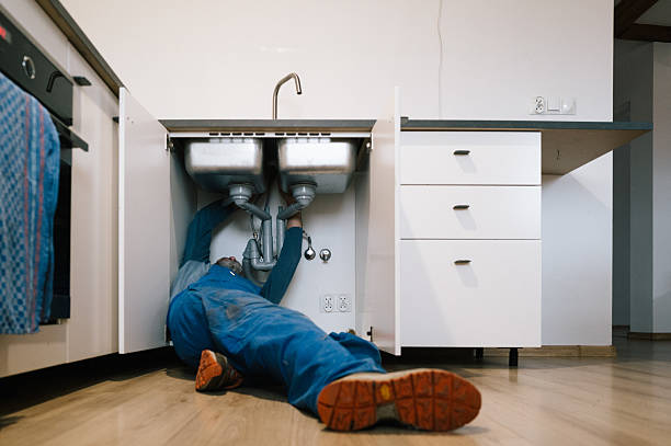 Professional Drain Cleaning technician working in Weirsdale, FL